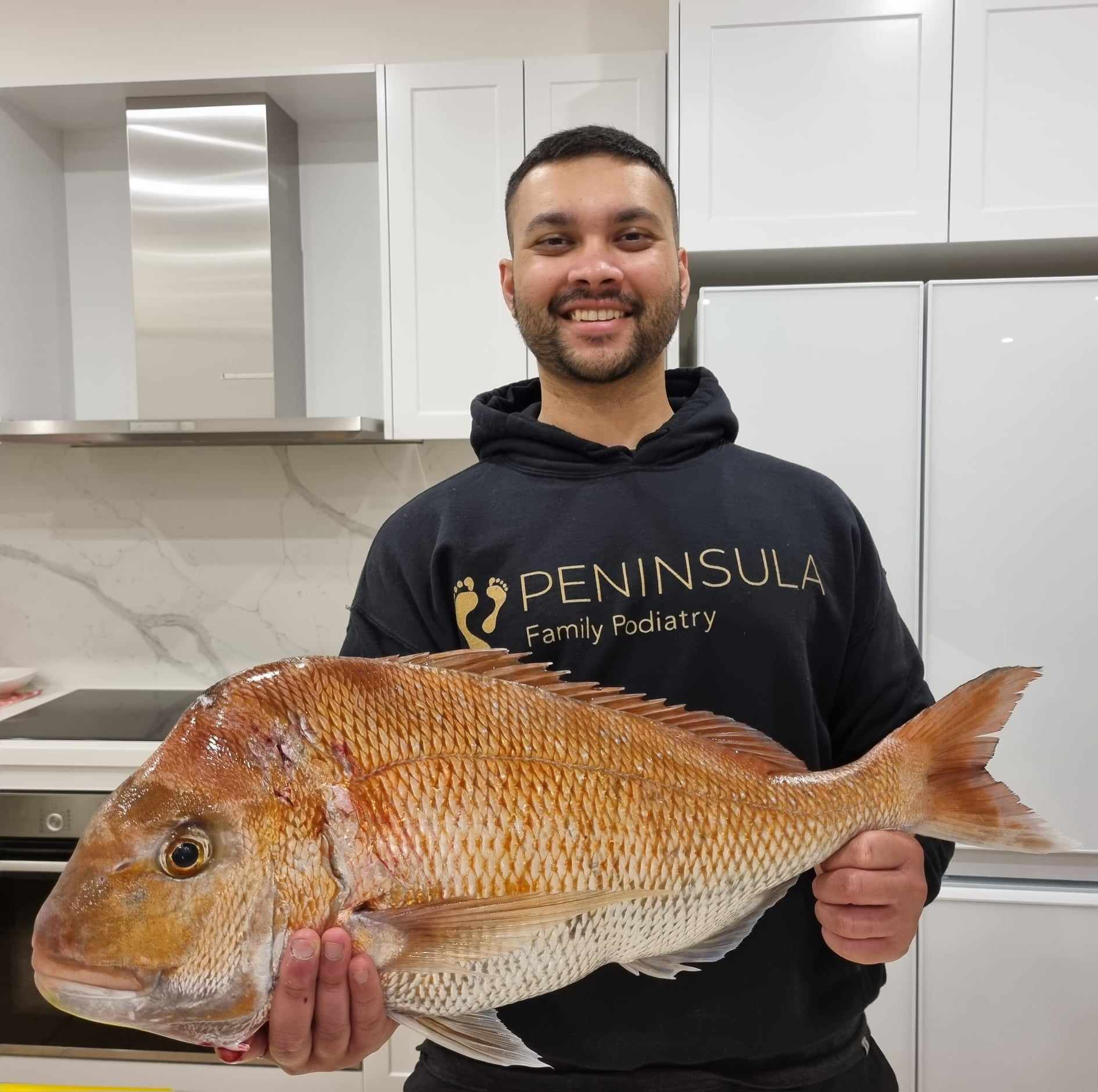 dillon holding a fish