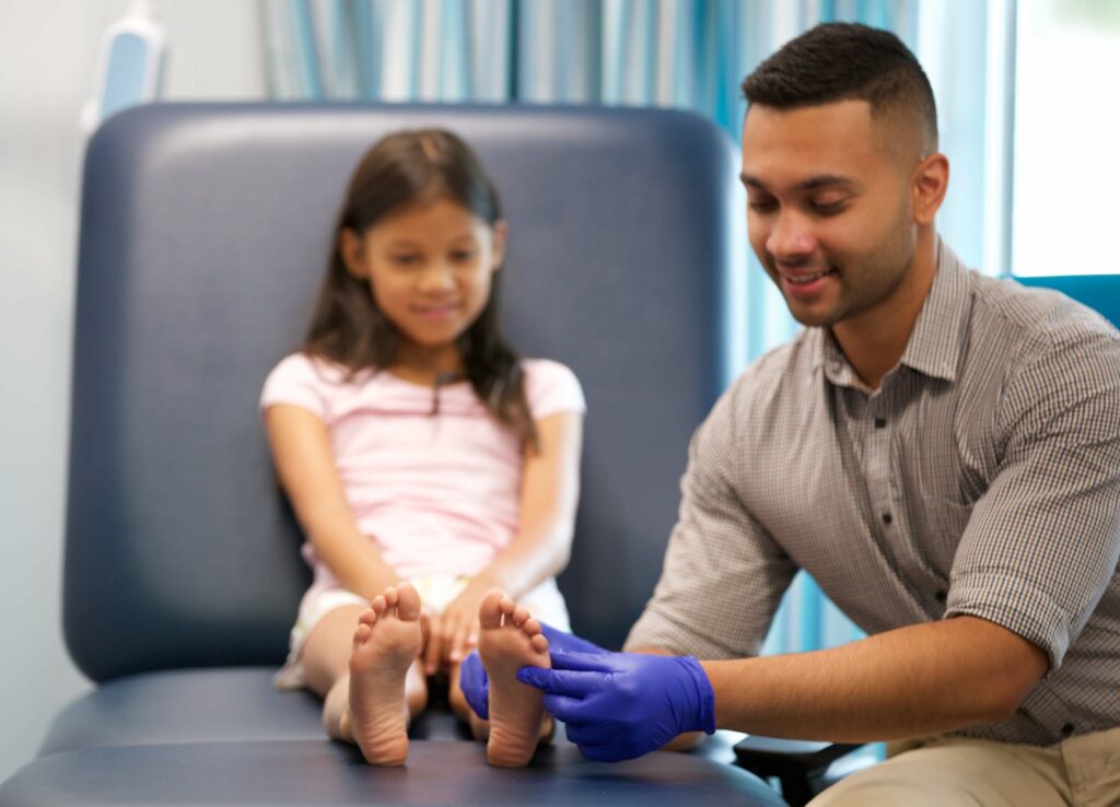 podiatrist treating a child's foot